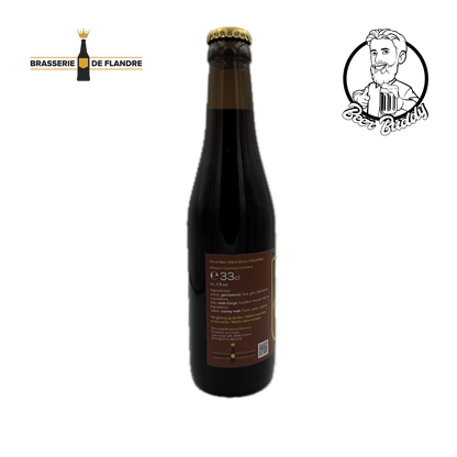 Een donkere glazen fles Ad Vitam Stout-bier, gebrouwen door Brasserie De Flandre, staat gecentreerd tegen een witte achtergrond. Het etiket toont een kroon- en zonnestraalmotief boven de tekst "Ad Vitam Stout" in goud. Dit Belgisch diepdonker stoutbier benadrukt donkere mouten. Het logo van Brasserie De Flandre verschijnt in de linkerbovenhoek.